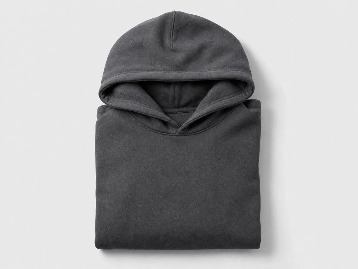 Charcoal grey custom hoodie, flat-lay product photo on a neutral studio background.