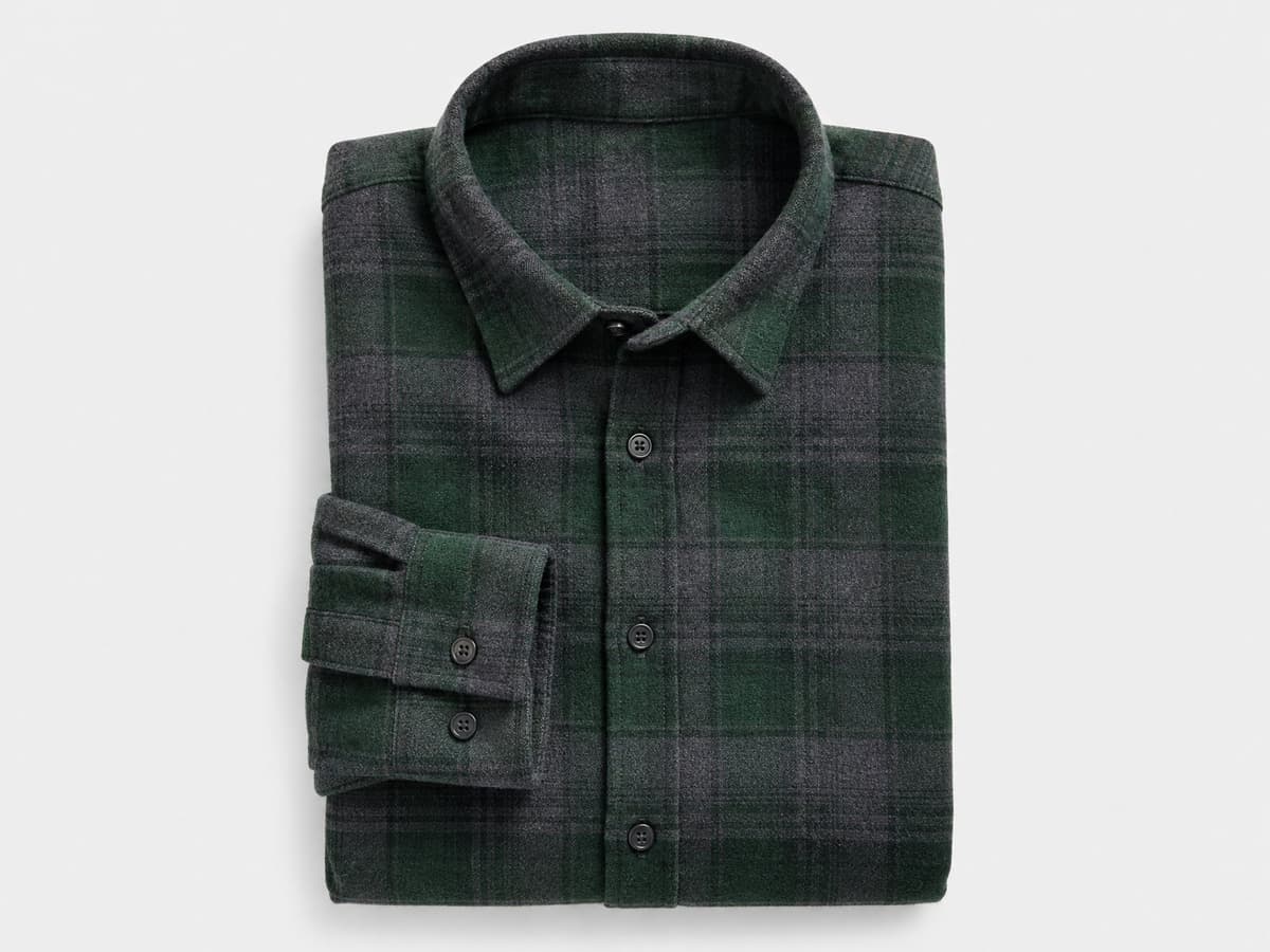 Forest green and charcoal custom men's flannel shirt, flat-lay product photo.